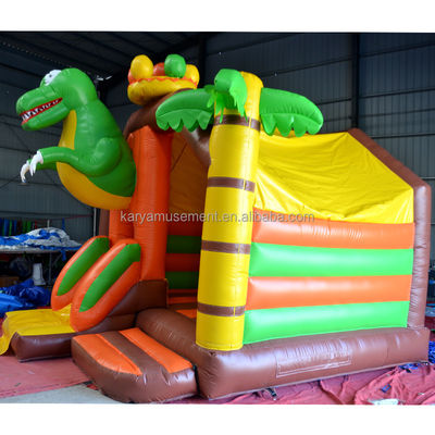 Número OEM Capacidad 100-500kg Dinosaurio Castillo inflable con combinación de diapositivas