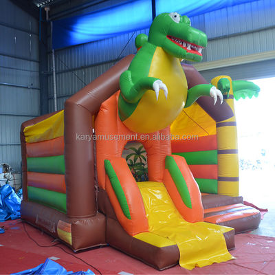 Número OEM Capacidad 100-500kg Dinosaurio Castillo inflable con combinación de diapositivas