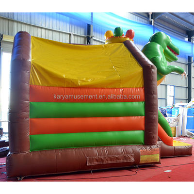 Número OEM Capacidad 100-500kg Dinosaurio Castillo inflable con combinación de diapositivas