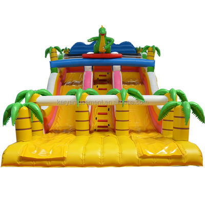 Juego de Parque al aire libre de 2 carriles Palma tropical PVC Inflatable Dinosaurio Salto Salto tobogán