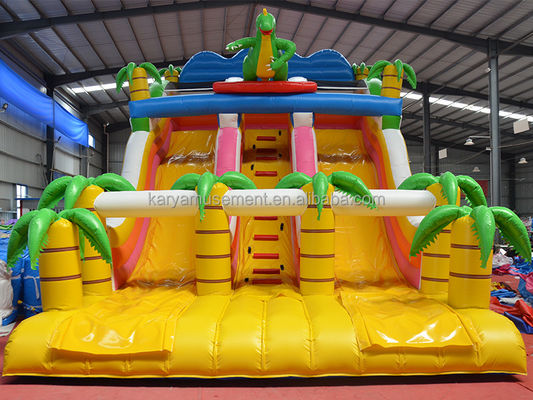 Juego de Parque al aire libre de 2 carriles Palma tropical PVC Inflatable Dinosaurio Salto Salto tobogán