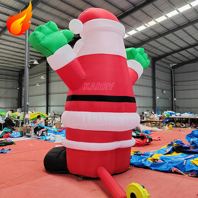 Fiesta de Navidad caliente 4 metros de altura Inflable gigante Santa Claus con características portátiles