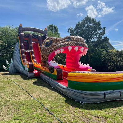 Deslizador de salto inflable de PVC personalizado con tema de dinosaurio jurásico Deslizador de agua con piscina