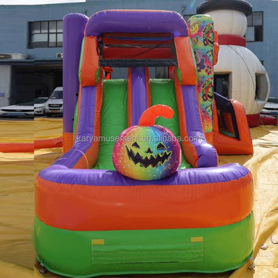 Casa de Halloween unisex con tobogán de agua de doble canal y castillo inflable de arco iris