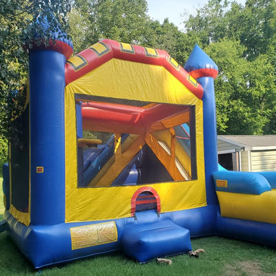 Trampolín inflables para niños Casa de salto con obstáculo de deslizamiento y piscina de salpicaduras