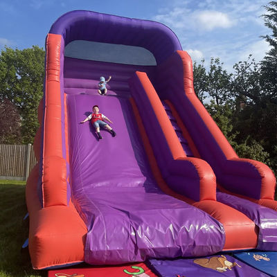Salto en el patio trasero trineo seco para niños y adultos trineo de agua pvc púrpura en interiores