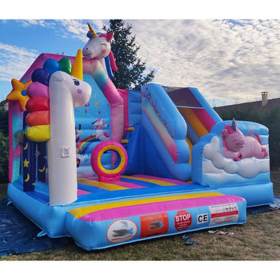 Juegos de trampolín para niños de PVC comercial Rainbow Unicorn Inflatable Fun City con tobogán