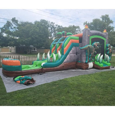 Dinosaurios del Jurásico Comercial PVC Inflable Casa de rebote con deslizamiento con soplador