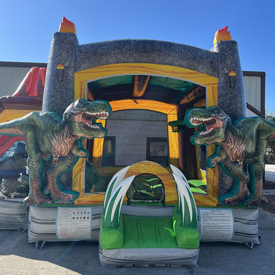 Dinosaurios del Jurásico Comercial PVC Inflable Casa de rebote con deslizamiento con soplador