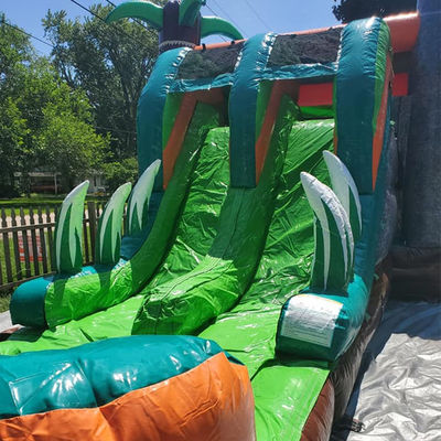 Dinosaurios del Jurásico Comercial PVC Inflable Casa de rebote con deslizamiento con soplador