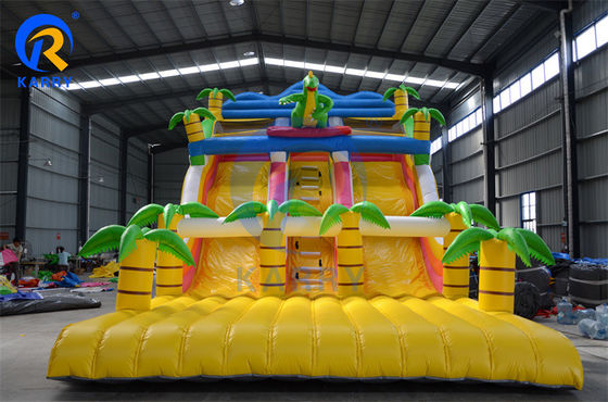 Casa de salto con tobogán comercial de dinosaurios tropicales