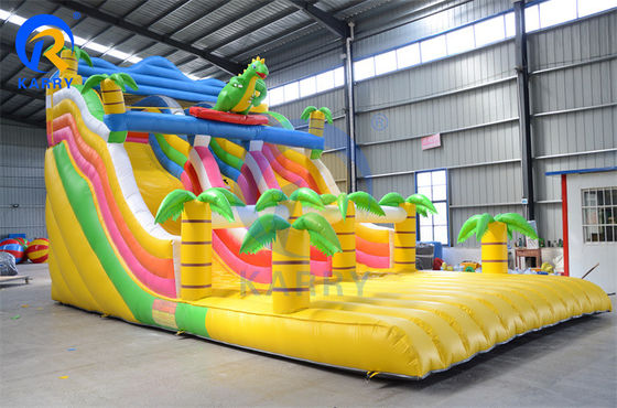 Casa de salto con tobogán comercial de dinosaurios tropicales