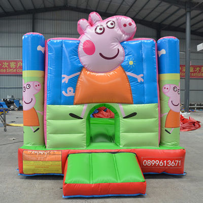 Unisex Hot Pink Cartoon Pig Castillo de salto con tobogán y aventura de mar de PVC personalizada