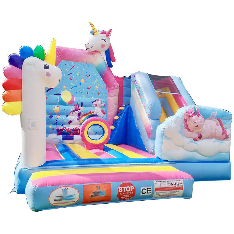 Juegos de trampolín para niños de PVC comercial Rainbow Unicorn Inflatable Fun City con tobogán